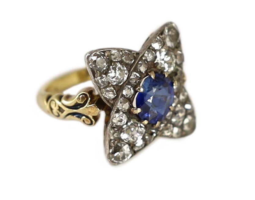 A mid 20th century 18ct gold, sapphire and diamond star shaped cluster dress ring